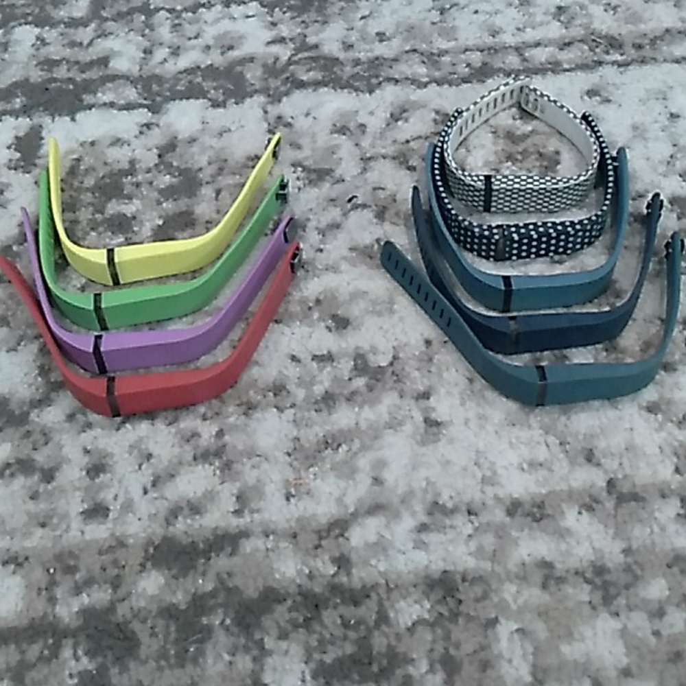 Set of 9 multicolor Fitbit watch cases